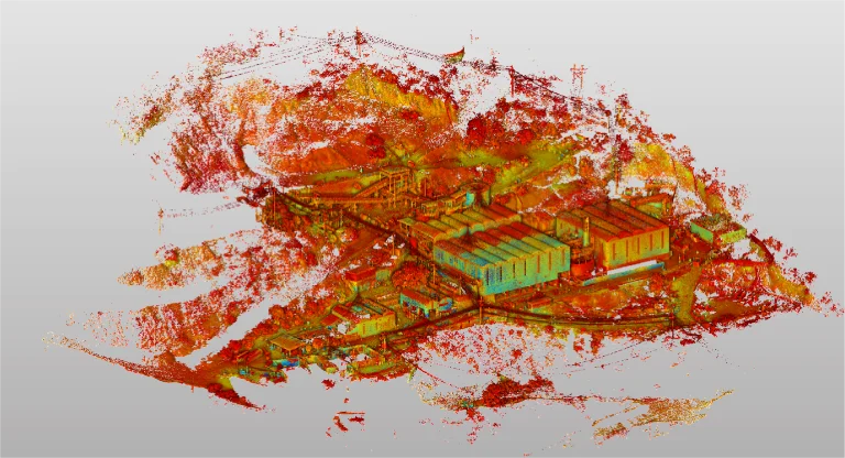 Una colorida nube de puntos 3D de Mina DIABRAS, que muestra detallados edificios y estructuras industriales en rojo, naranja, amarillo y verde sobre un fondo gris claro