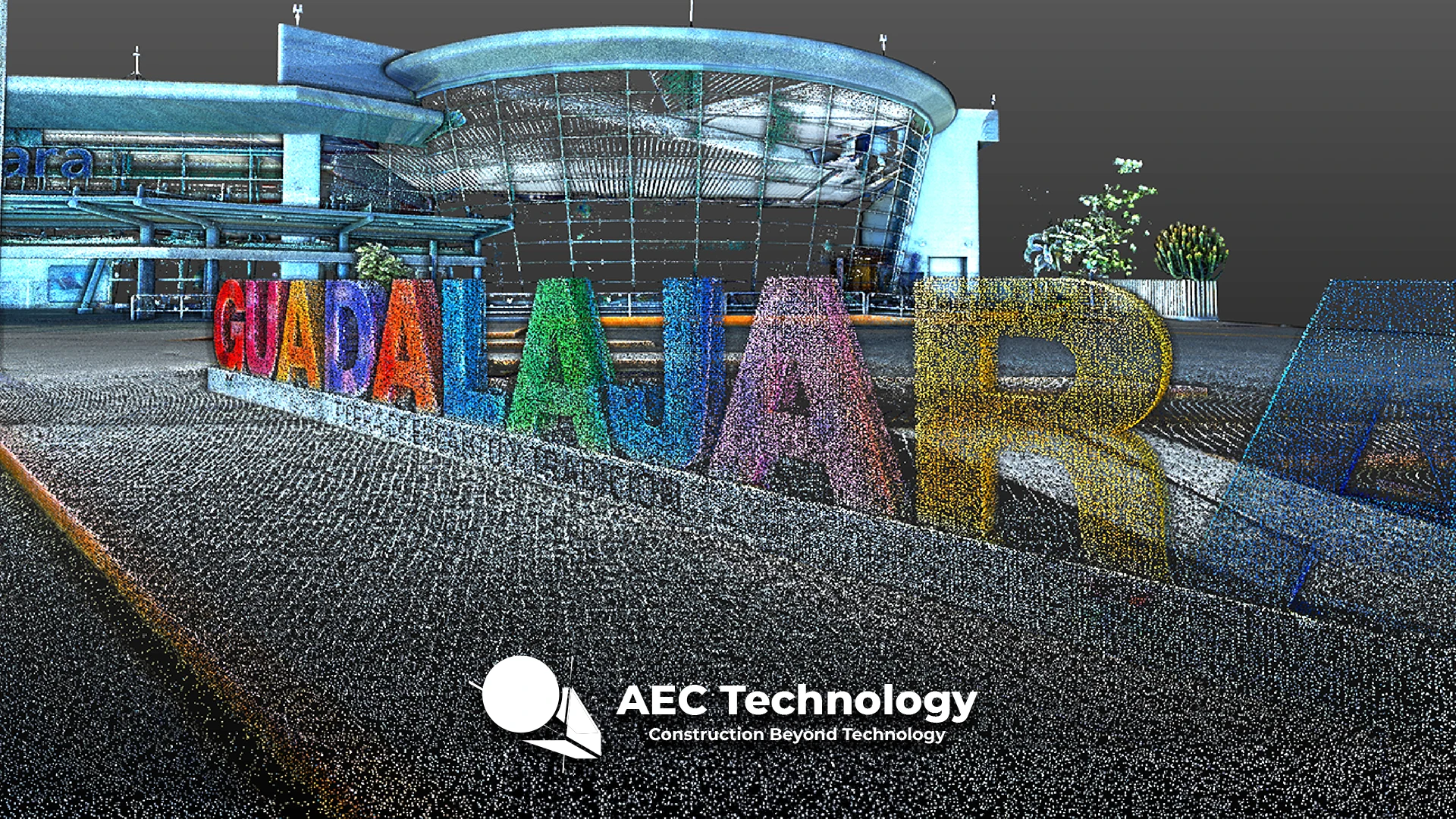 Nube de puntos de la señal de Guadalajara se sitúa ante un moderno edificio cerca del Aeropuerto Internacional de Guadalajara, mostrando coloridas letras en 3D y llamativos detalles arquitectónicos.