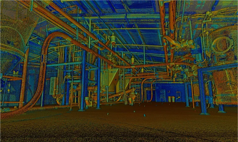 Interior de una planta industrial con grandes depósitos, tuberías y maquinaria. La imagen tiene un filtro azul verdoso y naranja, que resalta la estructura y la complejidad del equipamiento de la Planta Industrial Mondeléz