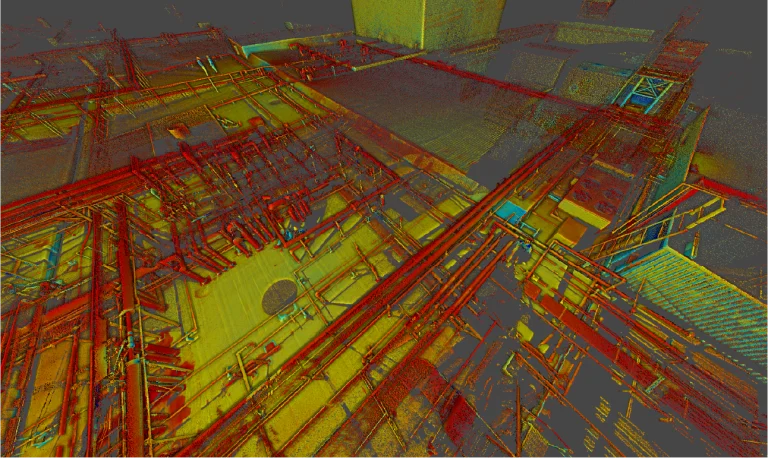 Nube de puntos de la Planta Industrial Sukarne revela una compleja red de tuberías y estructuras metálicas rojas, amarillas y verdes vistas desde arriba