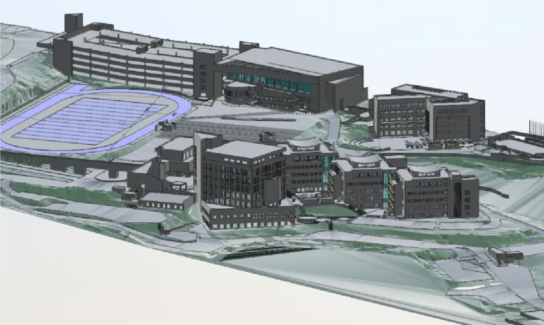 Modelo BIM del campus de Monterrey muestra varios edificios, un campo de deportes con pista de atletismo y carreteras y caminos circundantes en un terreno en pendiente