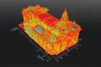 Colorful 3D point cloud scan of the historic Ibero-American Library, showing architectural details and height variations, overlaid on a dark background with plane measurements along the base.