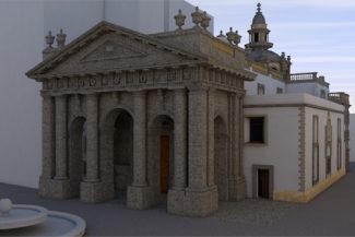 A stone building with classical columns and ornate details, known as the Ibero-American Library, stands next to a simpler white structure, with a fountain in the foreground and a domed tower in the background, under a partly cloudy sky.