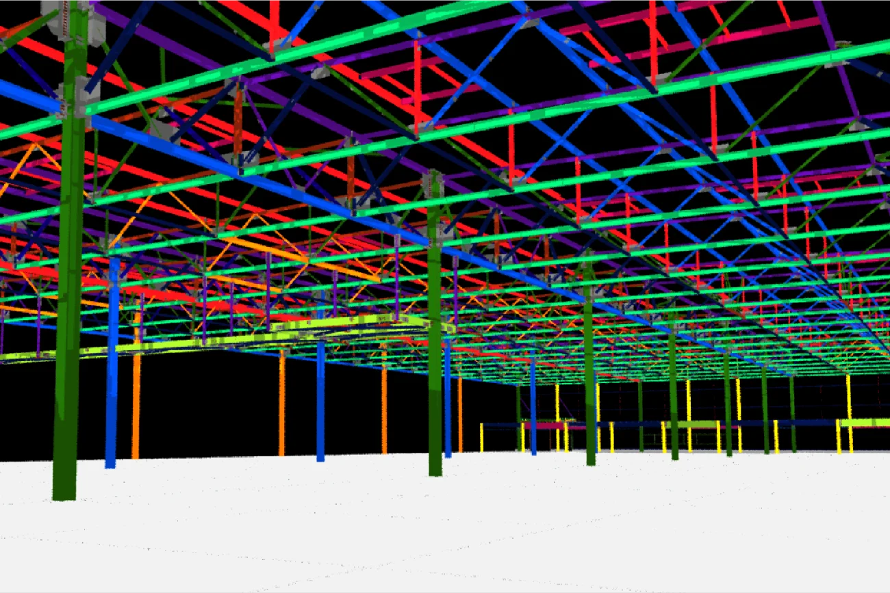 Colorful 3D model of the structure of a BMW Industrial Plant, with beams, columns, and supports in red, blue, green, yellow, and purple on a black background with a white floor.