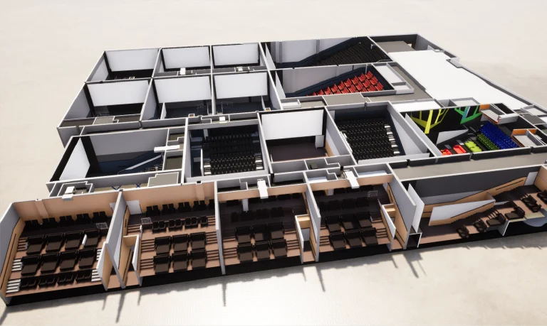 Representación en 3D de la planta del edificio de Cinépolis Mitikah que muestra varias salas, incluidos varios auditorios con filas de asientos, pasillos y estructuras de color en el lado derecho, vista desde arriba en ángulo