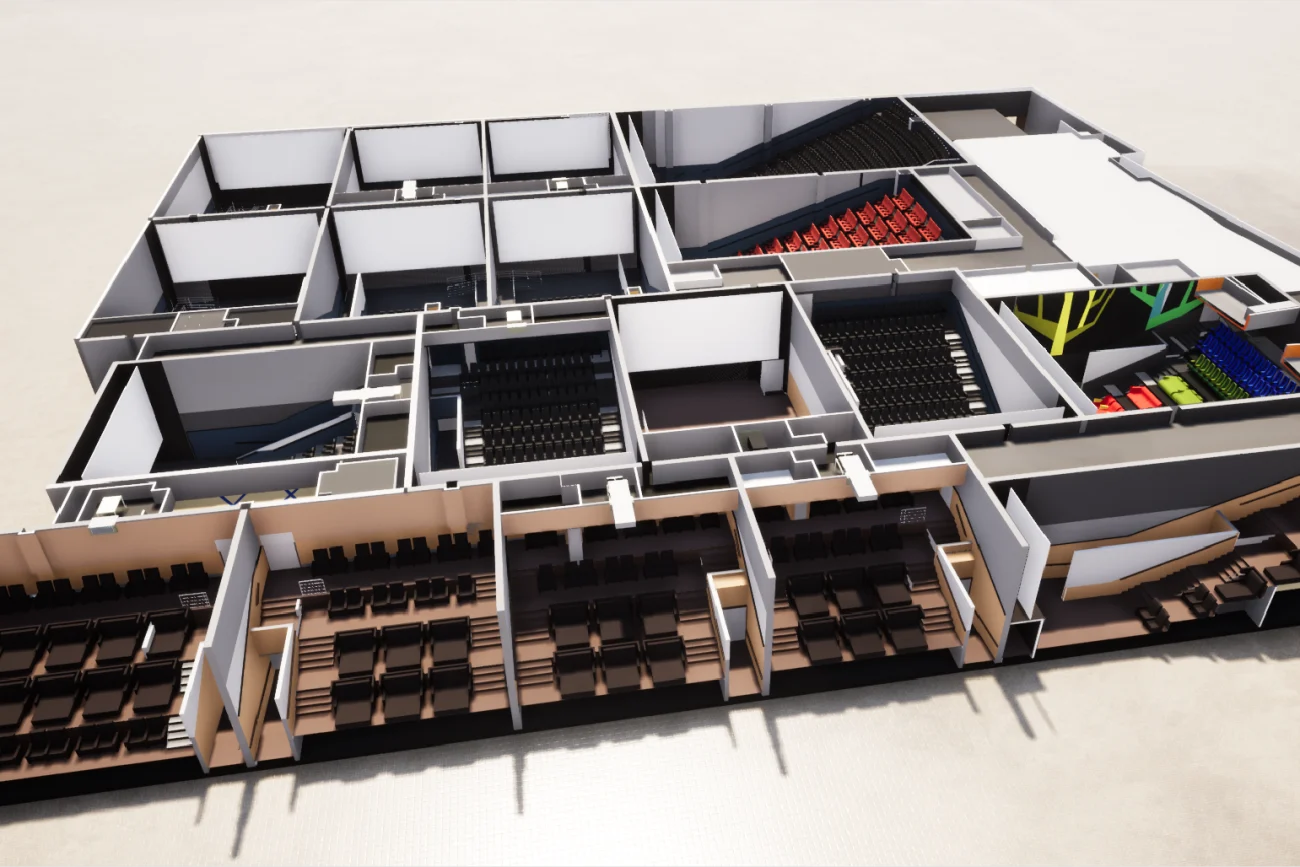 Una representación arquitectónica en 3D muestra una sección transversal de un edificio en Mitikah, con múltiples salas, pasillos y varios espacios de cine Cinépolis llenos de filas de sillas rojas, negras o azules.