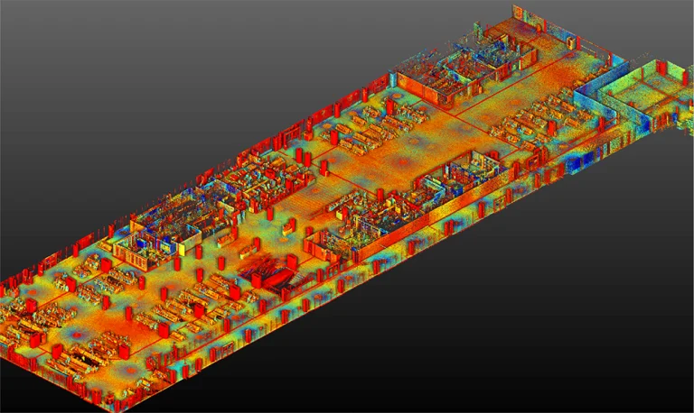 Nube de puntos en 3D del Aeropuerto Internacional de Tijuana, que muestra puntos de datos de colores que representan equipos, mobiliario y elementos estructurales en vibrantes tonos rojos, naranjas, amarillos, azules y verdes