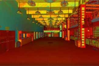 Esta sala de conciertos de Ciudad de México, una gran sala interior con un techo alto e hileras de luces colgantes, se muestra una nube de puntos que resalta diversas superficies en tonos rojos, amarillos, verdes y azules.