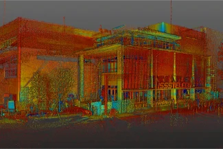 Colorful 3D point cloud of a modern building in León, with detailed architectural lines, trees, and shadows. The word ISSSTELE is visible on the facade of the ISSSTE Medical Center.