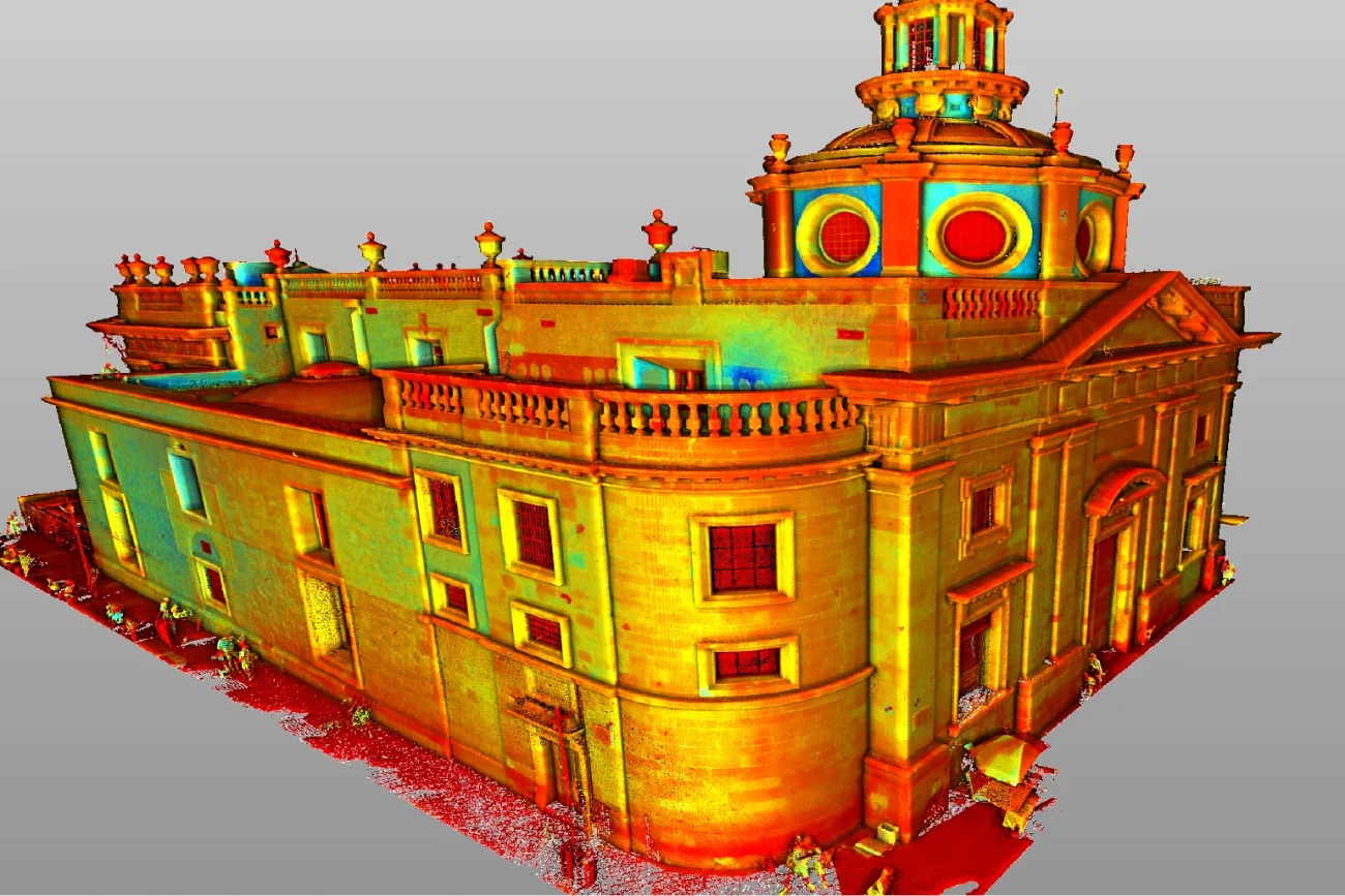 A 3D colorized point cloud model of the Ibero-American Library, a large classical building with arched windows and domes, displaying height or intensity values with a gradient from red at the base to blue at the top.