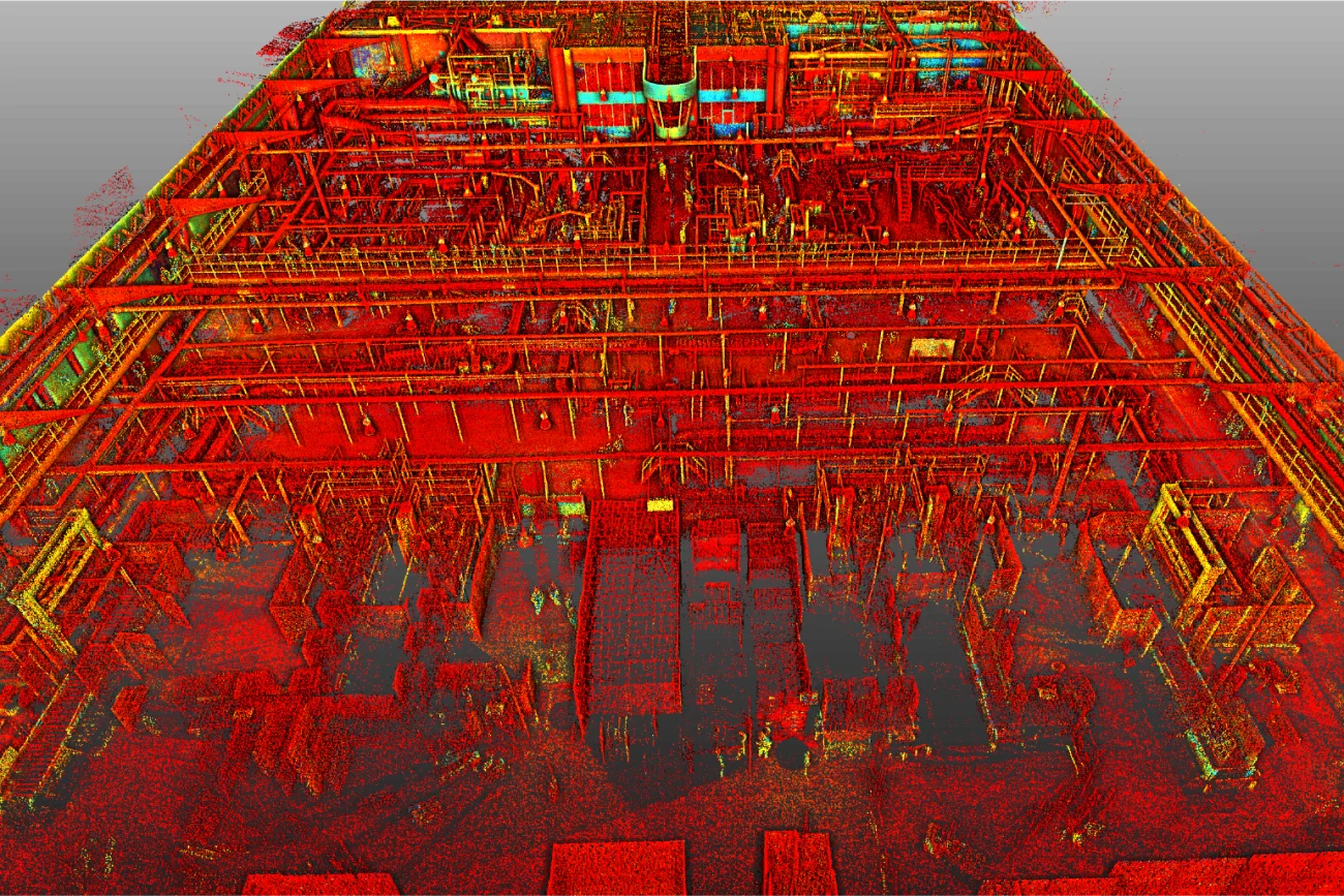 Colorful 3D point cloud scan of a Coca Cola plant, showing detailed structural elements, pipes, beams, and machinery in shades of red, orange, yellow, and green.