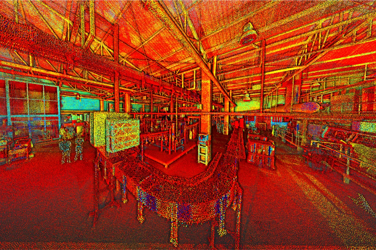 A large industrial-style room reminiscent of an Industrial Plant, with exposed beams, skylights, bookshelves, and tables, depicted in vivid red, orange, and yellow heatmap tones for a bold and stylized look.