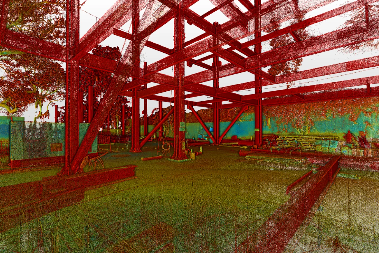 A building in Corteza featuring a green floor and a striking brick wall, ideal for modern residential housing development.