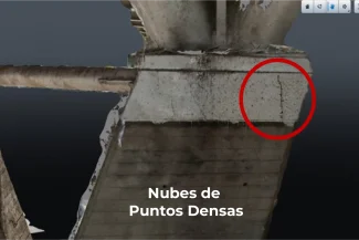 Primer plano de la estructura de un puente de hormigón que muestra una grieta visible dentro de un círculo rojo, con el texto en español Nubes de Puntos Densas en la parte inferior. Fotografía Digital Técnica hace hincapié en los detalles estructurales.