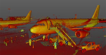 Un avión comercial está aparcado en la pista de un aeropuerto con escaleras de embarque. Cerca, trabajadores con chalecos de seguridad y un vehículo de servicio coordinan los preparativos, ayudados por la tecnología Escaneo LiDAR CDMX para mejorar la seguridad y la eficiencia.